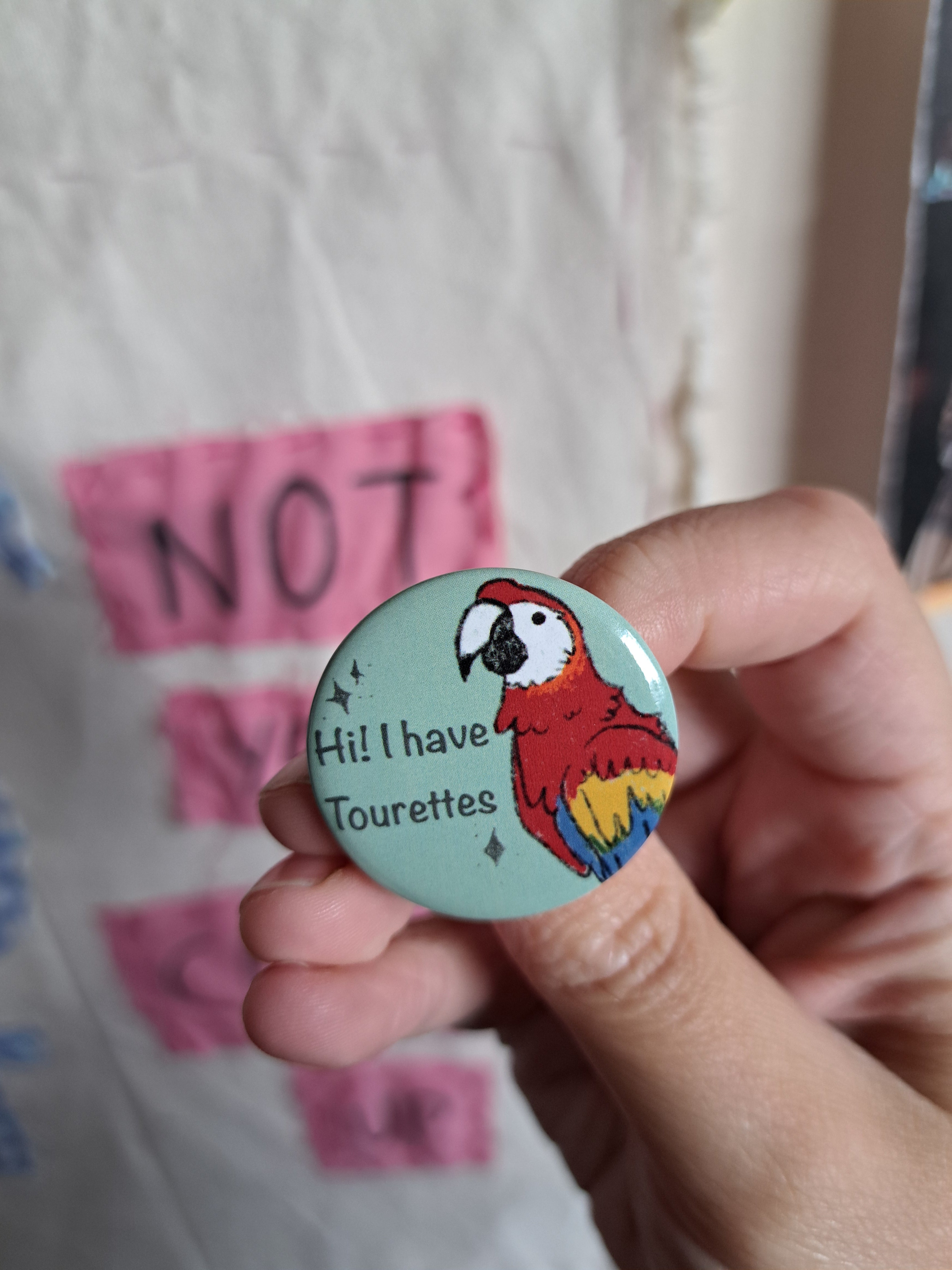 Tourettes badge